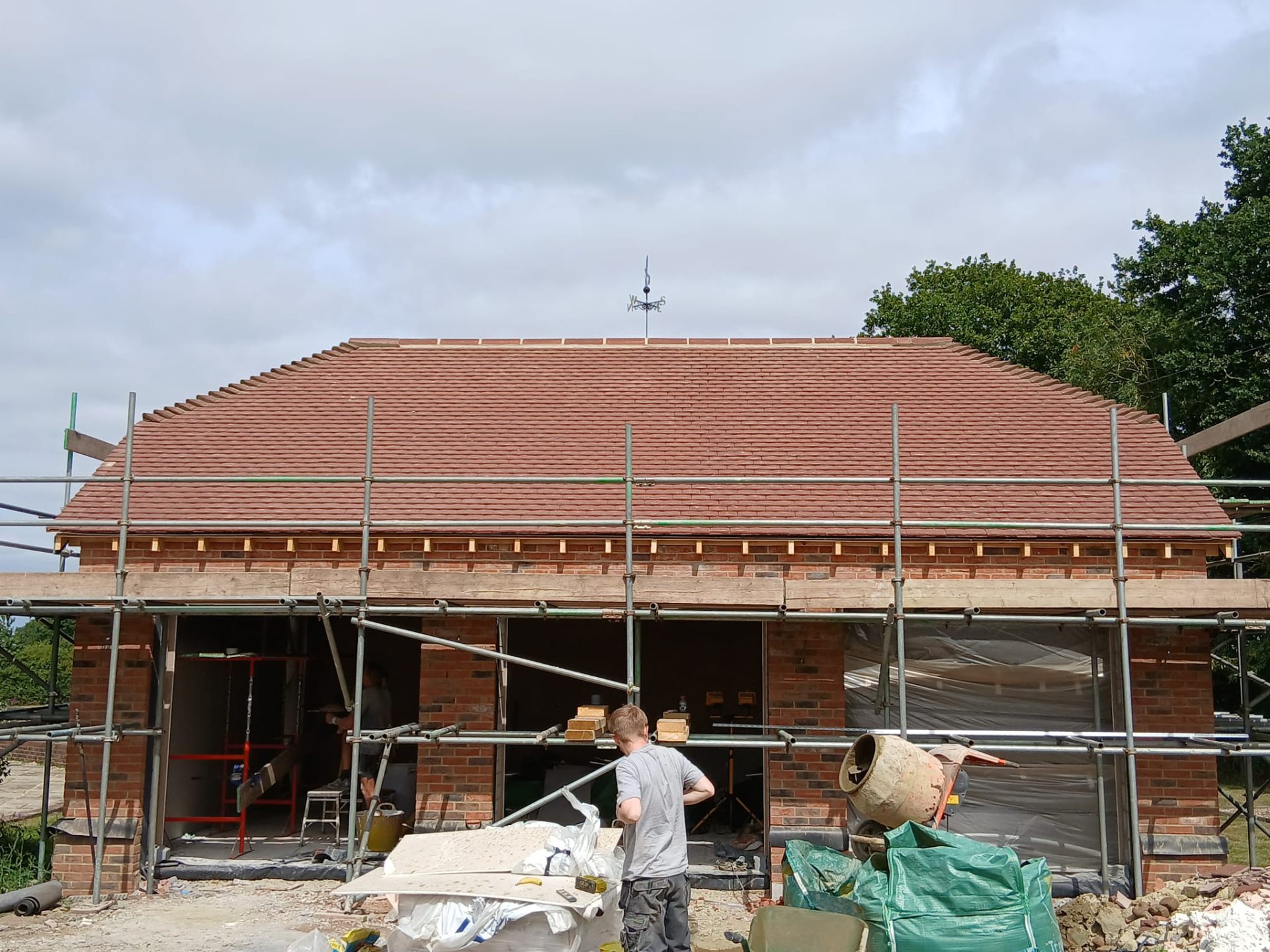 Completed clay tile re-roof by SJB Roofing Kent